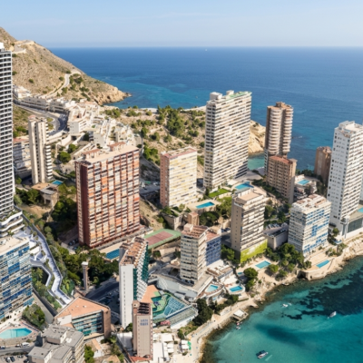 Aerial view of the Skyhotel tower and its urban surroundings by the sea