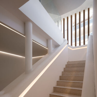Detail of the communal staircase of the ONE Ibiza and the vertical screen.